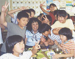 Gail having fun with students in Japan